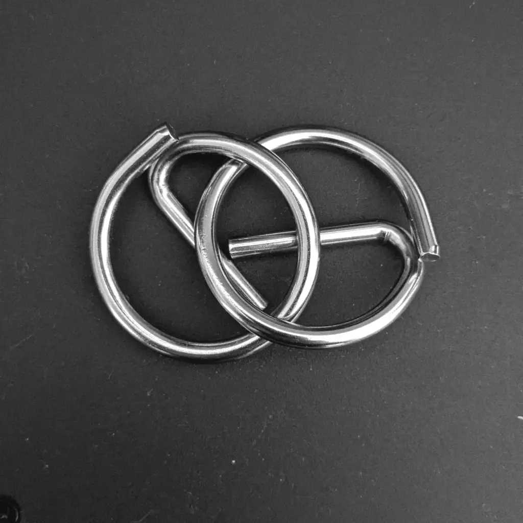 Metal Puzzle on a black background cover art for simple song blog