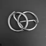 Metal Puzzle on a black background cover art for simple song blog